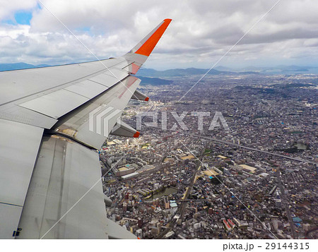 the airplane is taking off over city the airplane is taking off over city 29144315