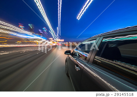 View from Side of Car moving in a night city View from Side of Car moving in a night city 29145518