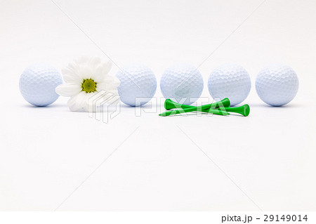 White golf balls and sping flower  29149014