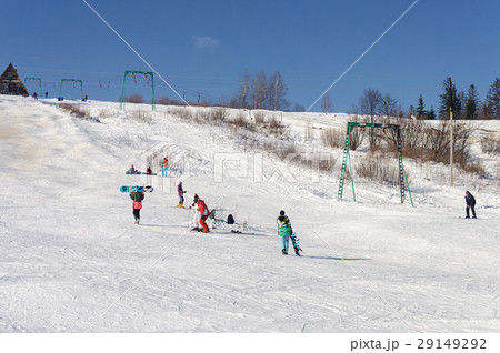 Skiers on mountain slope in Carpathians, Ukraine 29149292