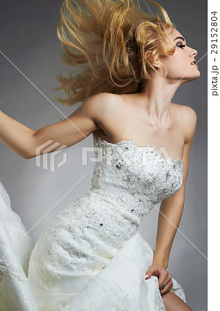 dancing Beautiful bride woman in wedding dress 29152804