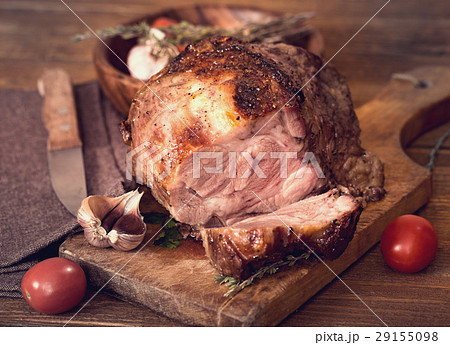 Sliced roasted pork on board Sliced roasted pork on board 29155098