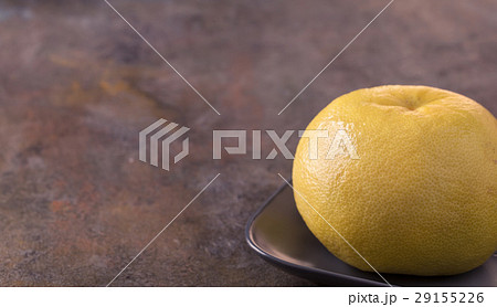 Sweetie on plate from right side of old background 29155226