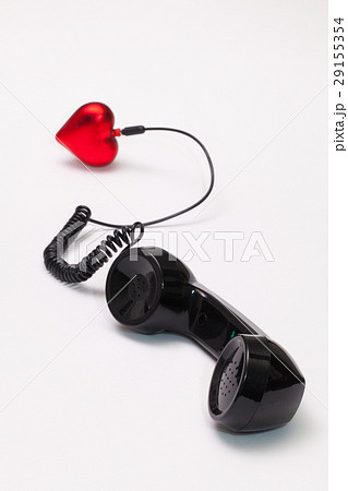 Old phone reciever and red heart. 29155354