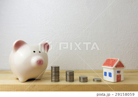 piggy bank with house and coins piggy bank with house and coins 29158059