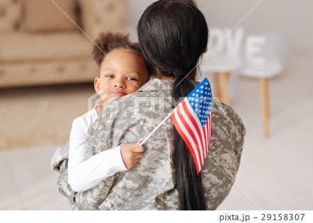 Emotional child really happy seeing her mother Emotional child really happy seeing her mother 29158307
