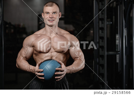 sexy caucasian man and woman in gym . sexy caucasian man and woman in gym . 29158566
