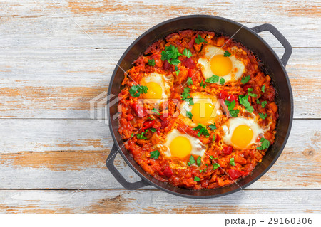 shakshuka - fried eggs, onion, bell peppe 29160306