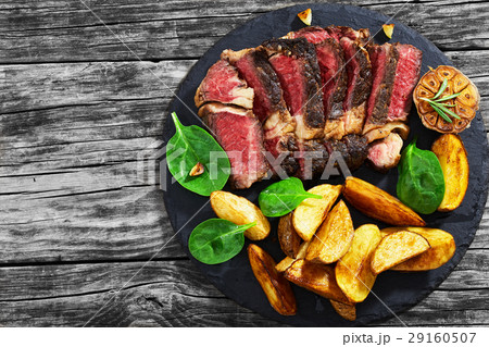 Juicy rib eye beef steak medium rare 29160507