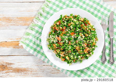 parsley salad or Tabbouleh on white platter 29160518