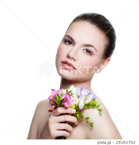 Beautiful Model holding Flowers. 29161702
