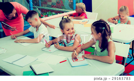cheerful kids at school lesson . cheerful kids at school lesson . 29163783