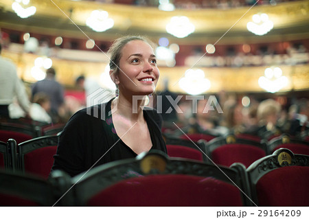 Portrait of woman in auditorium of theatre . 29164209