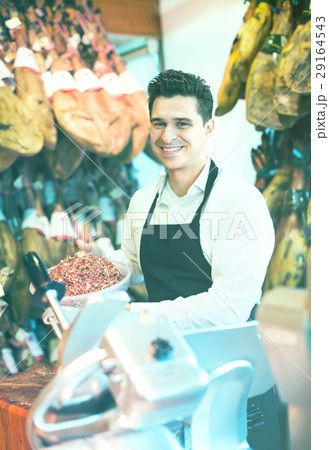 Worker selling Spanish jamon 29164543