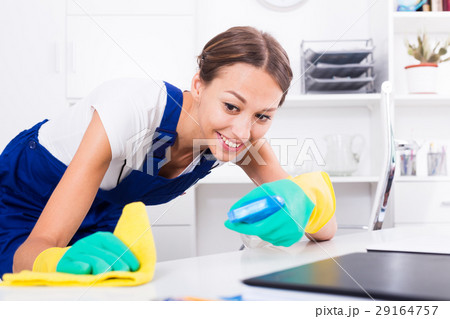 woman cleaning in company office 29164757
