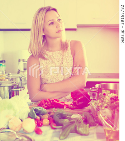 Depressed housewife feeling blue indoors 29165782