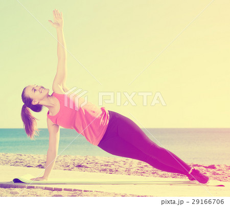 Female training at sea beach 29166706