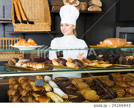 Girl cook gladly suggesting pastry 29166943