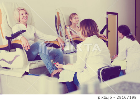 Two clients having pedicure Two clients having pedicure 29167198