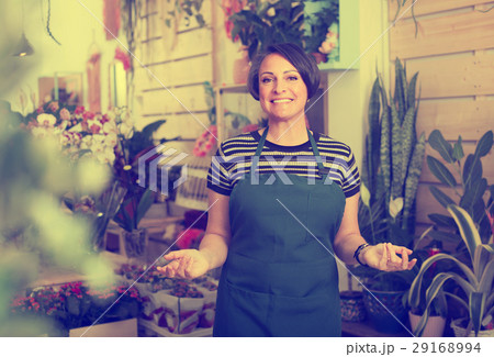 florist smiling among plants 29168994