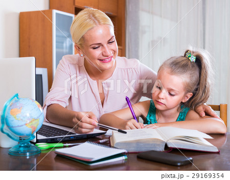 teacher and girl studying at home teacher and girl studying at home 29169354