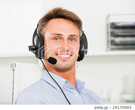 Operator answering at call center Operator answering at call center 29170905