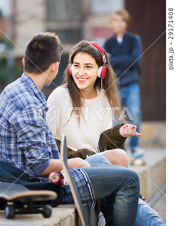 teen and his friends after conflict outdoors 29171408