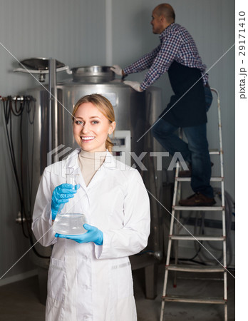 Two brewery workers on beer factory. 29171410