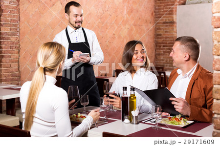 Male waiter writing down order 29171609