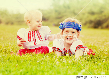 children in folk clothes in summer children in folk clothes in summer 29172366