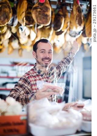 Seller offering sorts of meat 29173661