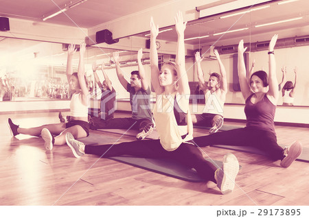 People stretching in dance hall 29173895