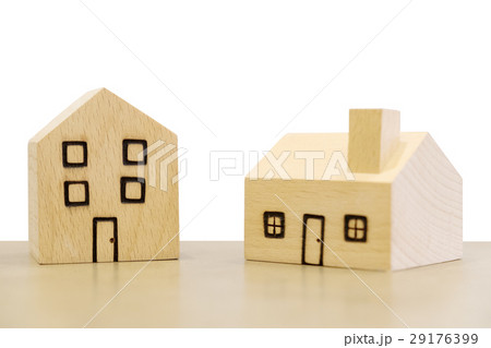 Miniature wooden houses on white background. Miniature wooden houses on white background. 29176399