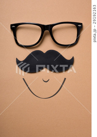 eyeglasses and mustache forming a face 29192163