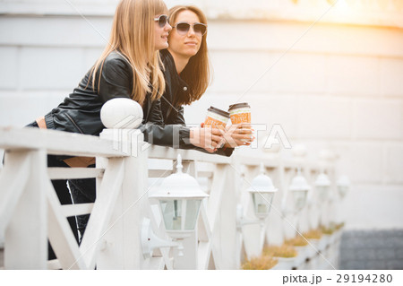 Portrait of two beautiful young girlfriends with Portrait of two beautiful young girlfriends with 29194280