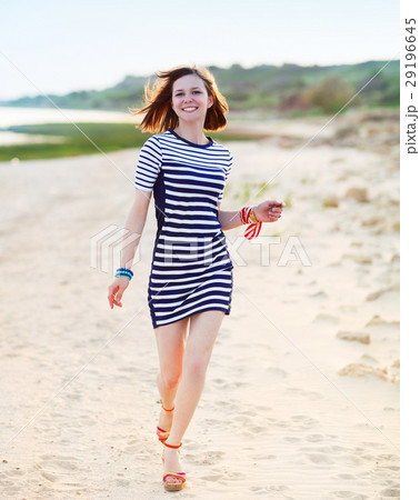 Portrait of the beautiful teen girl near the sea Portrait of the beautiful teen girl near the sea 29196645