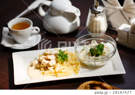 Closeup of pasta with chicken on plate Closeup of pasta with chicken on plate 29197477