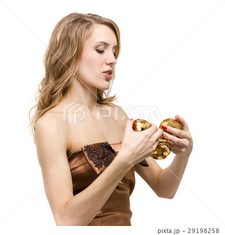 woman with christmas balls in hands, isolated on 29198258