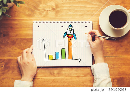 Rocket Graph with a person holding a pen Rocket Graph with a person holding a pen 29199263