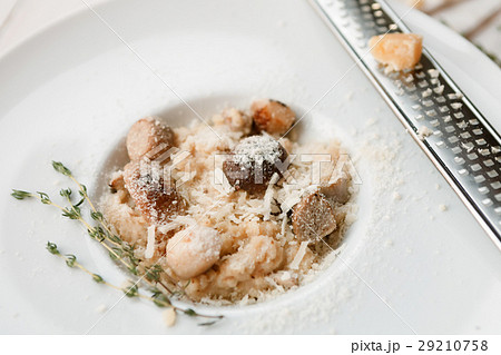Wild mushrooms risotto with rosemary and parmesan 29210758