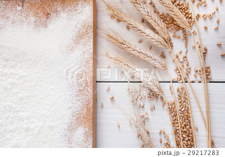 Baking concept on white wood background, sprinkled Baking concept on white wood background, sprinkled 29217283