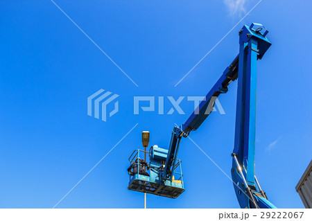 Electrical technician repairing street light  29222067