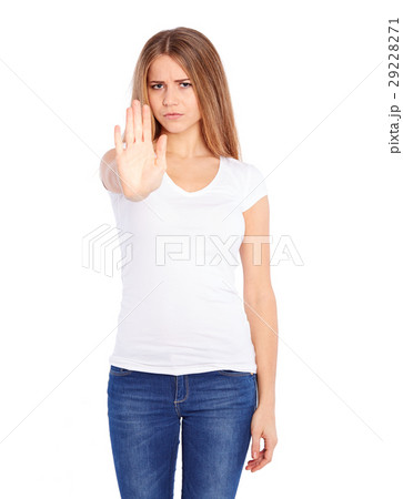 Young woman makes a gesture stop 29228271