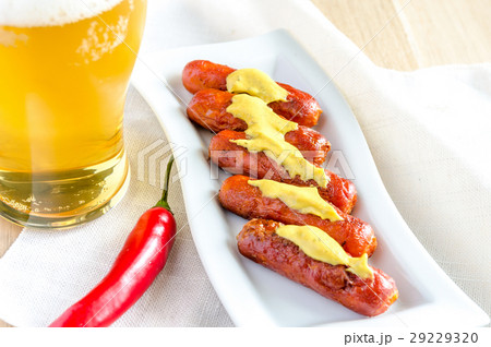 Roasted sausages with glass of beer Roasted sausages with glass of beer 29229320