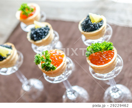 Sandwiches with black and red caviar 29229462