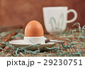 Egg in eggcup and cup of coffee for breakfast 29230751