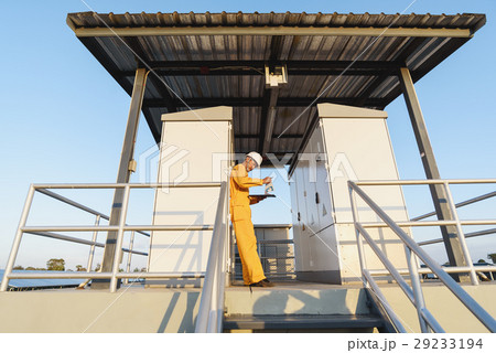 Engineers checking solar panels, Solar Energy  29233194