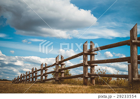 wooden rustic fence in village and blue sky wooden rustic fence in village and blue sky 29233554
