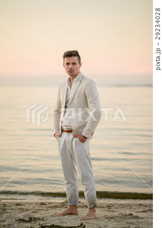 young handsome man at the beach young handsome man at the beach 29234028