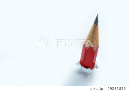 Red pencil and white torn paper Red pencil and white torn paper 29235826